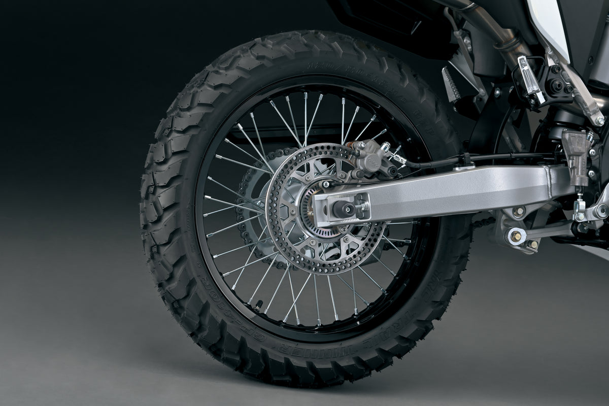 Protection axe de roue arrière Suzuki DR-Z400S – Motos Dario Colmar